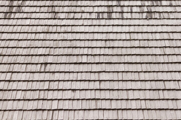 Old wooden roof. Horizontal view of shingles roof.