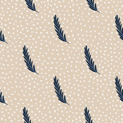 Hand drawn navy blue feather seamless pattern. Beige dotted background. Scrapbook doodle print.