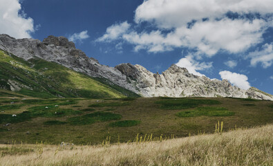 Fototapeta premium light and clouds on the peaks of the Gran Sasso massif and Campo Imperatore plateau 