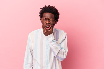 Young african american man isolated on pink background having a strong teeth pain, molar ache.