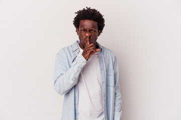 Young african american man isolated on white background  keeping a secret or asking for silence.