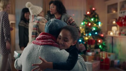 african american grandparents visiting for christmas hugging family giving presents enjoying festive holiday celebration on winter evening at home 4k footage - Powered by Adobe