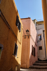 typical facade in the little village of Castelsardo - sardinia place to visit