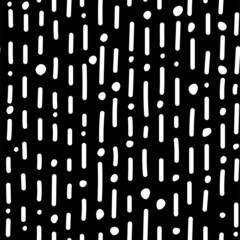 Vector illustration. Children's drawing. Spotted black and white background. Striped seamless pattern. Geometric abstract pattern of hand-drawn shapes. Round and linear organic shapes.