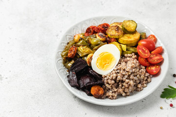 Egg buckwheat veggie bowl. Space for text.
