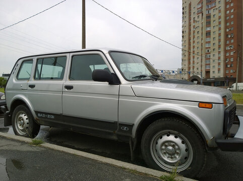 Lada Niva VAZ-2131 - popular Russian car manufacturer for the city, family and travel. Silver gray color. Legendary 4x4 SUV brand, produced by AVTOVAZ Group. Road.