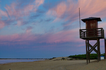 lifeguard tower at sunset