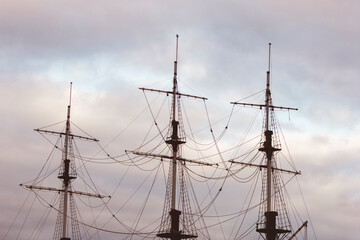 old ship vessel with masts horizon sky storm