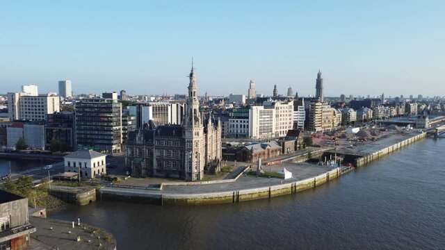 Aerial video of Antwerp skyline over the river Scheldt of the loodswezen and MAS museum