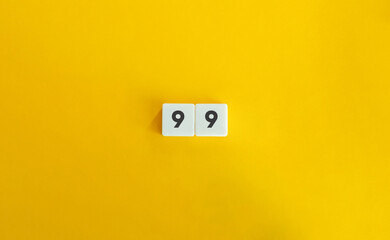 99 number banner and concept. Block letter tiles on bright orange background. Minimal aesthetics.