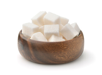 Wooden bowl of white refined sugar cubes