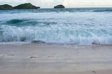 Beautiful beach and blue sea with small island.