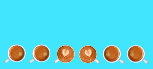 Pair of Heart Shaped Latte Art Cappuccino Coffee with Espresso Coffees in Line on Sky Blue Background