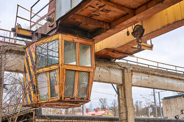 Control cabin of the old factory crane