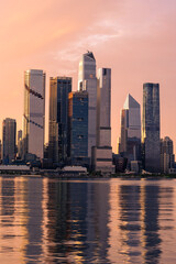 New York, NY - USA - Vertical image of the skyline of westside of midtown Manhattan at sunrise,...