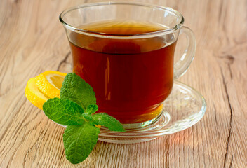ziołowa herbata miętowa z cytryną, herbata z cytryną i miętą, tea with mint and lemon  © kateej
