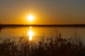 Fototapeta premium Astotin Lake under the Glow of the Setting Sun