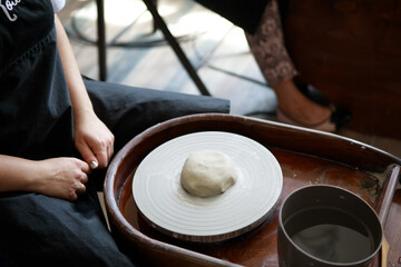 Master class on sculpting dishes (plates, cups) from clay.