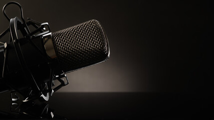 One microphone on a dark gray background. Minimalism. Sing, talk, radio, journalism, communication, sound amplification. There are no people in the photo. There is an empty space for insertion.