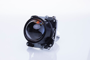 Automotive headlamp lens bi-xenon. Isolate on white background
