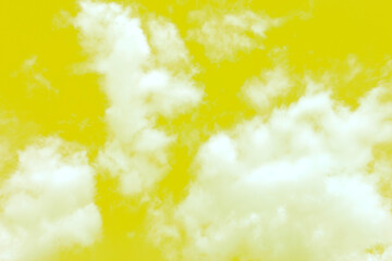 Yellow sky with clouds. The usual blue sky is colored yellow for positive and good mood.