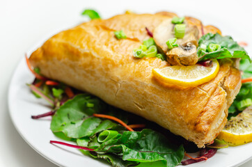 Steak and ale pasty, British steak with ale, potato and leek, wrapped in puff pastry