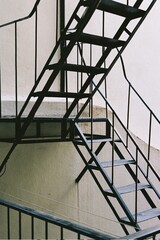 stairway to the sky. emergency exit. staircase in the back of the building. back staircase. stairs made of steel.