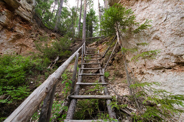 Wooden stairs on the rocks Tourist route 