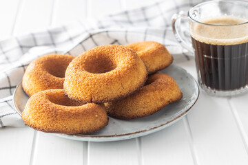 Round sponge cake dessert. Sweet donut.