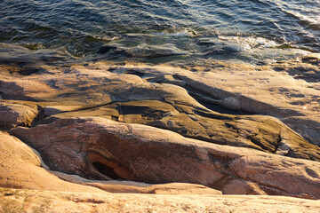 Smooth-surfaced rock by the sea