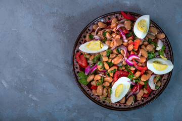 Piyaz local Turkish cuisine appetizer. Top view, empty space.