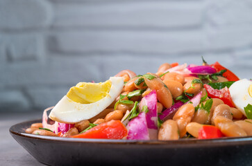 Piyaz salad with white beans, Turkish appetizer. Close-up.
