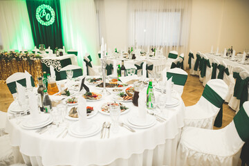 Interior of a restaurant prepared for wedding ceremony