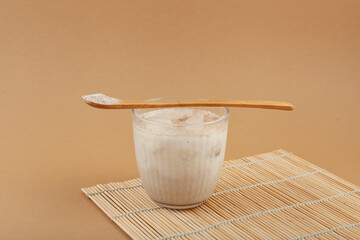 Misutgaru or Misugaru Latte drink. Korean milkshake with roasted multi-grain powder