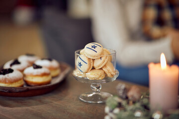 Cookies with star of David decoration during Hanukkah at home.