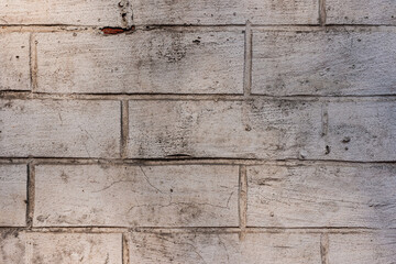 Old wall-  destroyed brick. Vintage background- cracks, chips