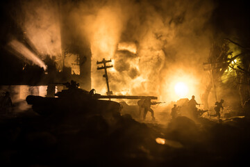 War Concept. Military silhouettes fighting scene on war fog sky background, World War Soldiers Silhouette Below Cloudy Skyline At night. Battle in ruined city.