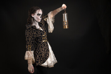 Young teenage girl dressed up for halloween as pirate ghost, wearing a victorian overcoat and lace