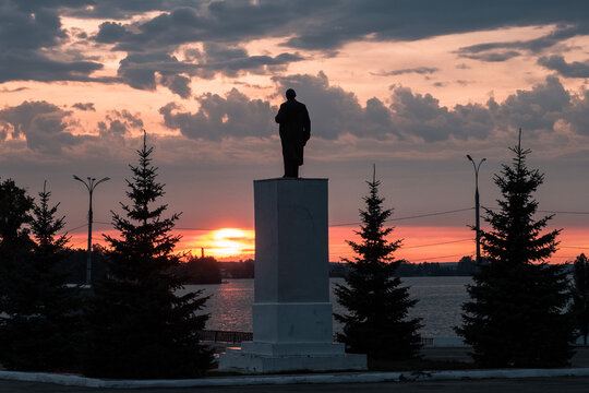 VOTKINSK, RUSSIA - AUGUST 26 2021: Lenin monument at sunset