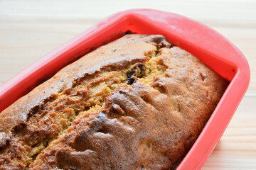 Banana bread baked in a silicone cake mold.