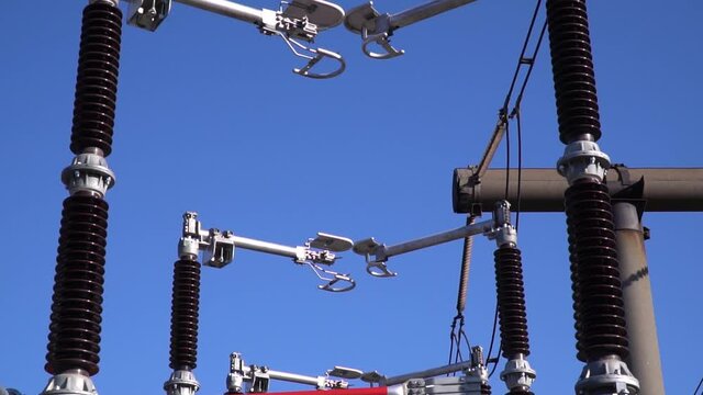 Footage of a transformer with the moving tops, solar power station facilities