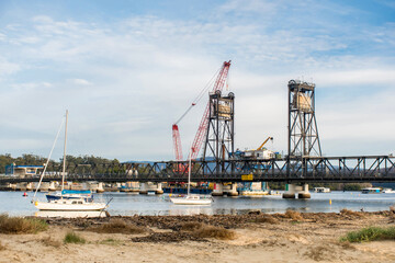 Fototapeta na wymiar New bridge construction replacement on a Clyde River. Batemans Bay. NSW, Australia, 