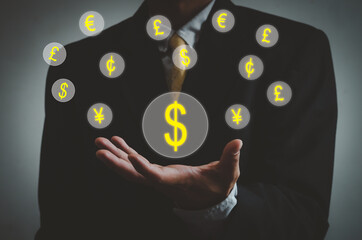 businessman icon currency on hand virtual screen. Investment business and concept finance