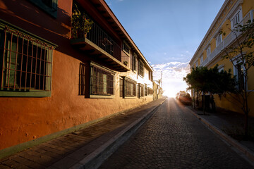 Fototapeta premium Mexico, Mazatlan, Colorful old city streets in historic city center near El Malecon and ocean shore.