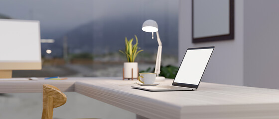 Workspace in modern and luxury home interior style with laptop mockup, blurred outside view, 3d rendering
