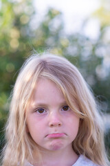 Emotions. A little girl expresses different emotions on her face. 