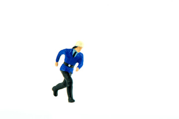 Miniature people engineer worker construction concept on white background with a space for text
