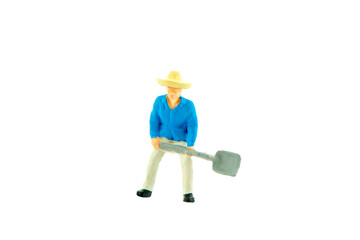 Miniature farmer people isolated with clipping path on white background . Elegant Design with copy space for placement your text, mock up for farmer and gradening concept.