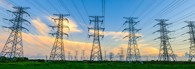 High voltage power tower industrial landscape at sunrise,urban power transmission lines. - obrazy, fototapety, plakaty