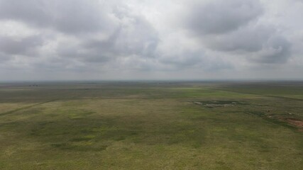 A storm is approaching the great plains in the land of enchantment, New Mexico. The grass is extra lush and super green from all the extra rainfall this season. Farmlife